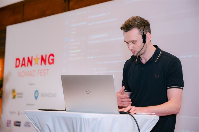 Sean building live on his laptop while presenting